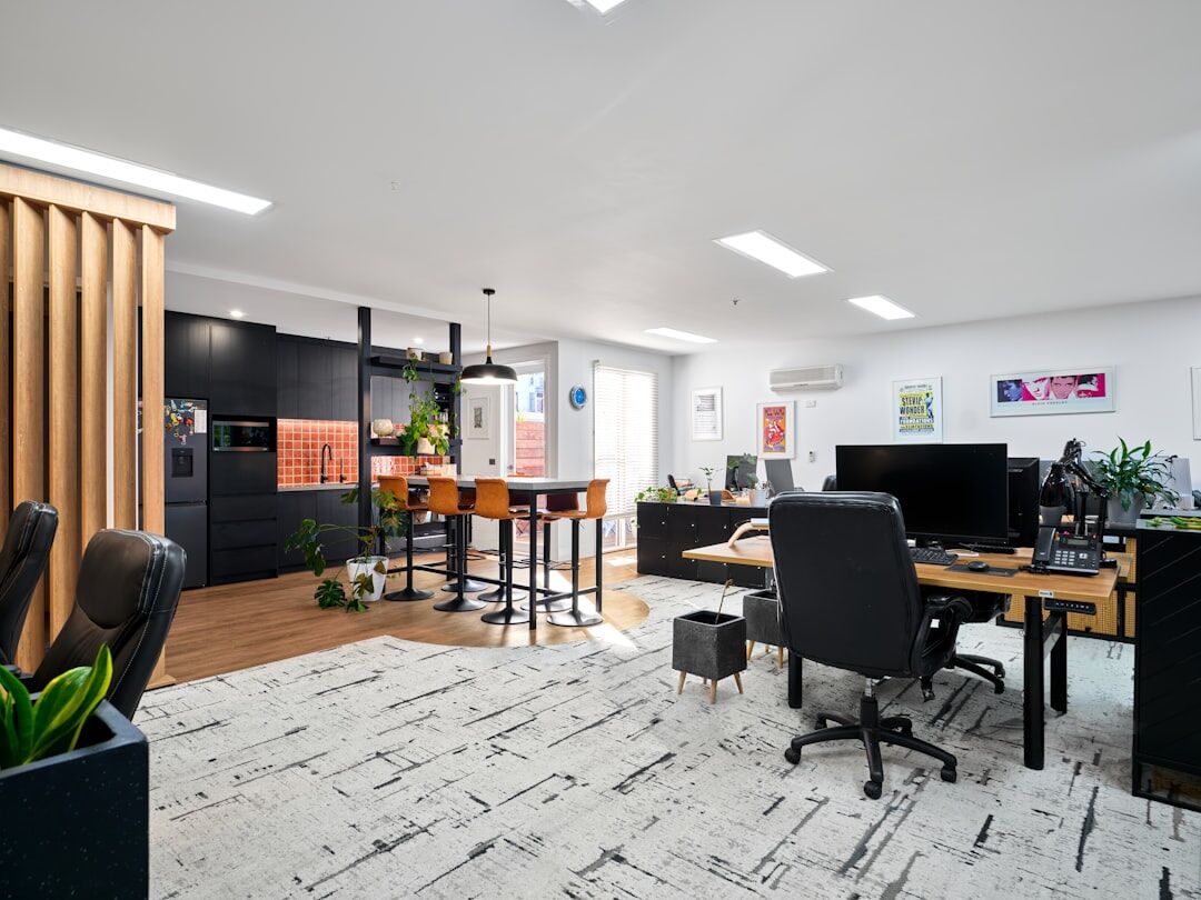 Modern bright office workspace with video production equipment
